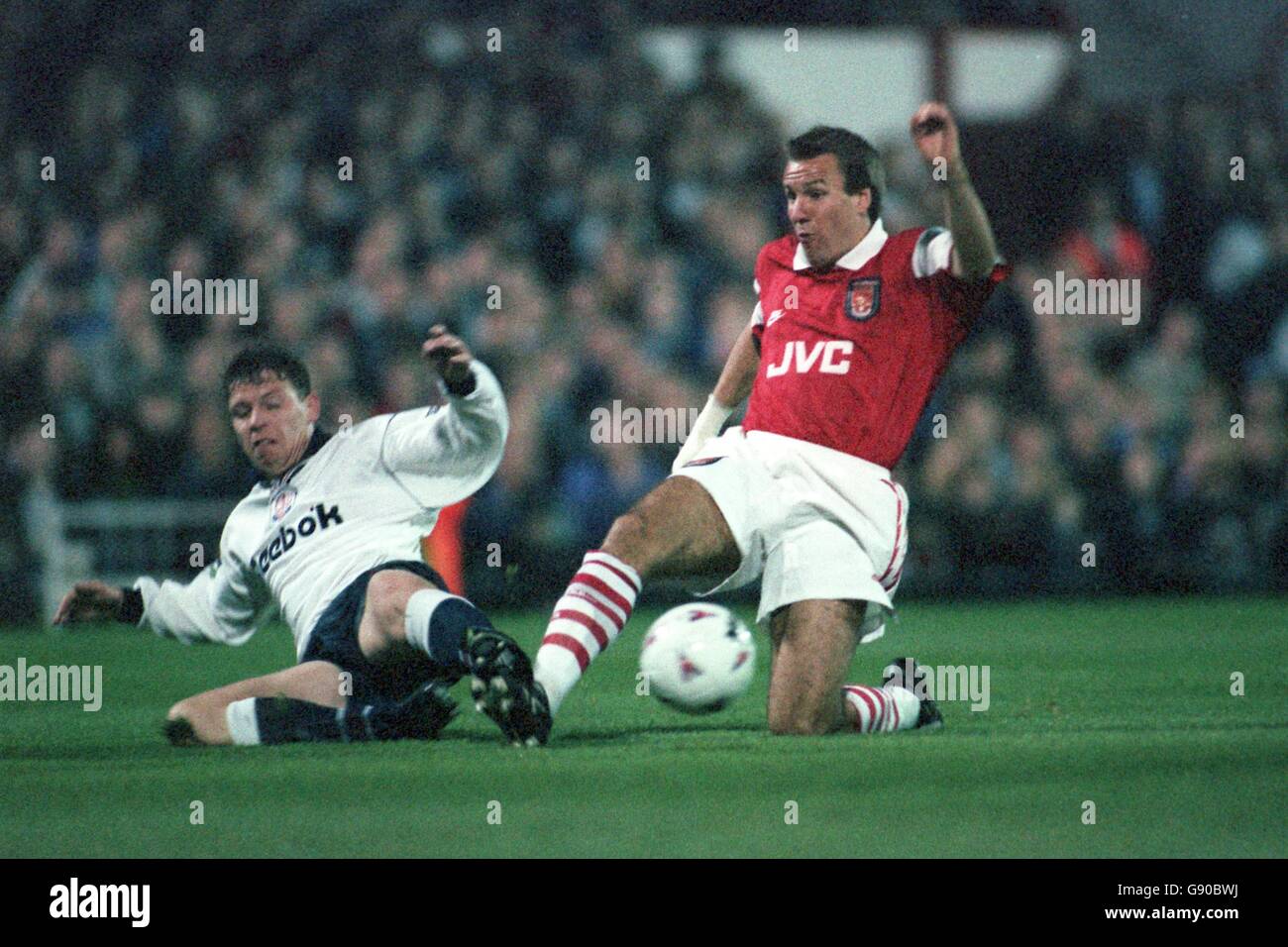 30-OCT-95. Bolton v Arsenal. Alan Thompson Bolton gets the ball away from Paul Merson Arsenal. PIcture by Laurence Griffiths/EMPICS Stock Photo