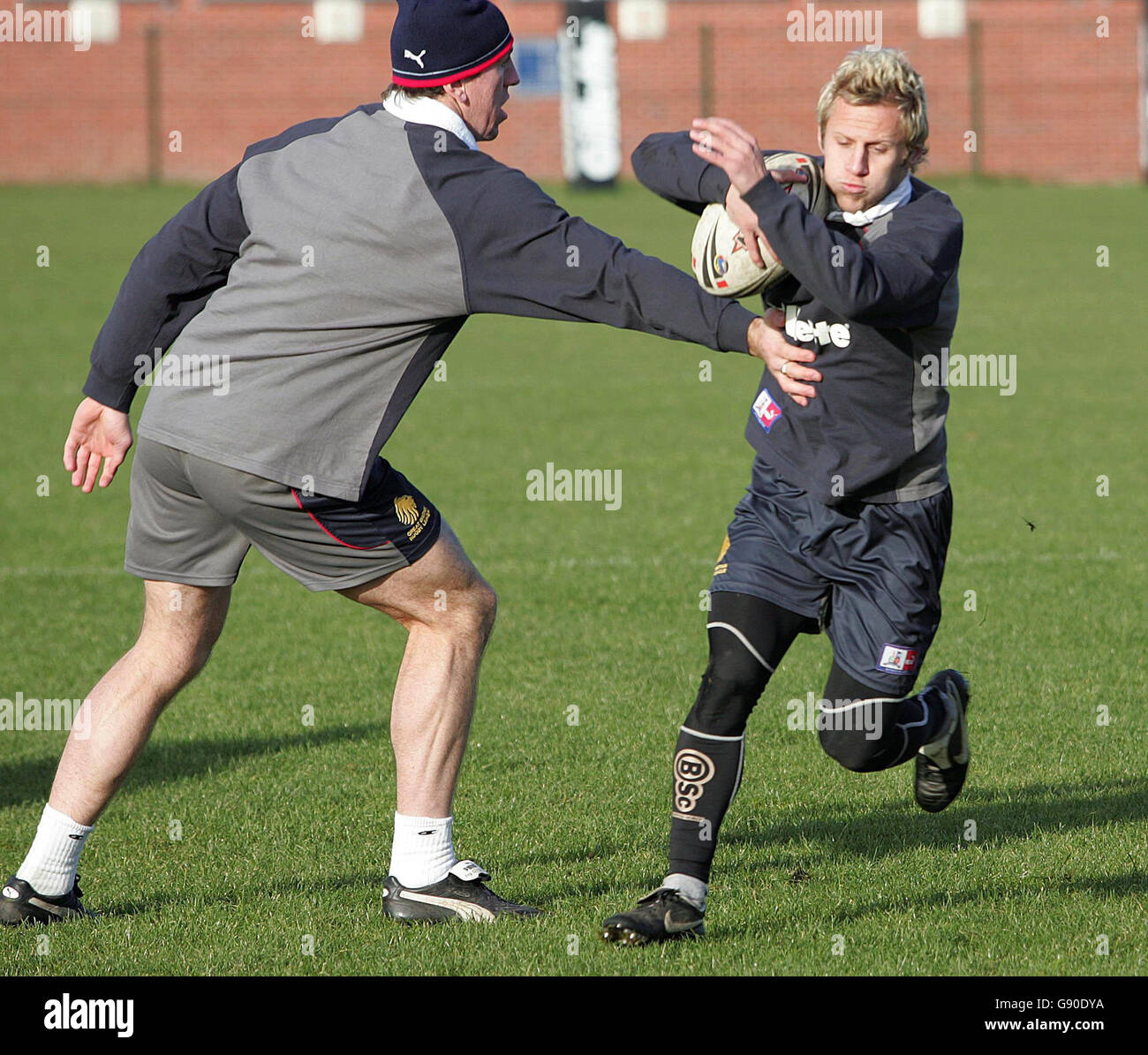 Great Britain's Rob Burrow (R) with Mick Fozzard during a training session at the Carrington Training ground, Manchester, Wednesday November 16, 2005. Great Britain will play Australia in the Gillette Tri-Nations Tournament at the KC Stadium in Hull on Saturday. PRESS ASSOCIATION photo. Photo credit should read: Martin Rickett/PA. Stock Photo