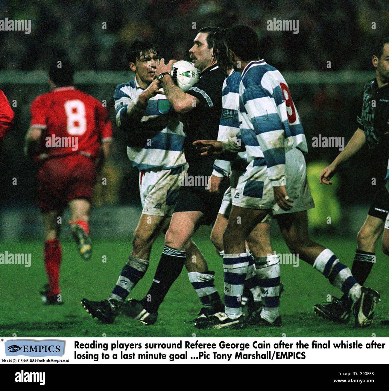 Reading players surround referee George Cain (centre) at the final ...