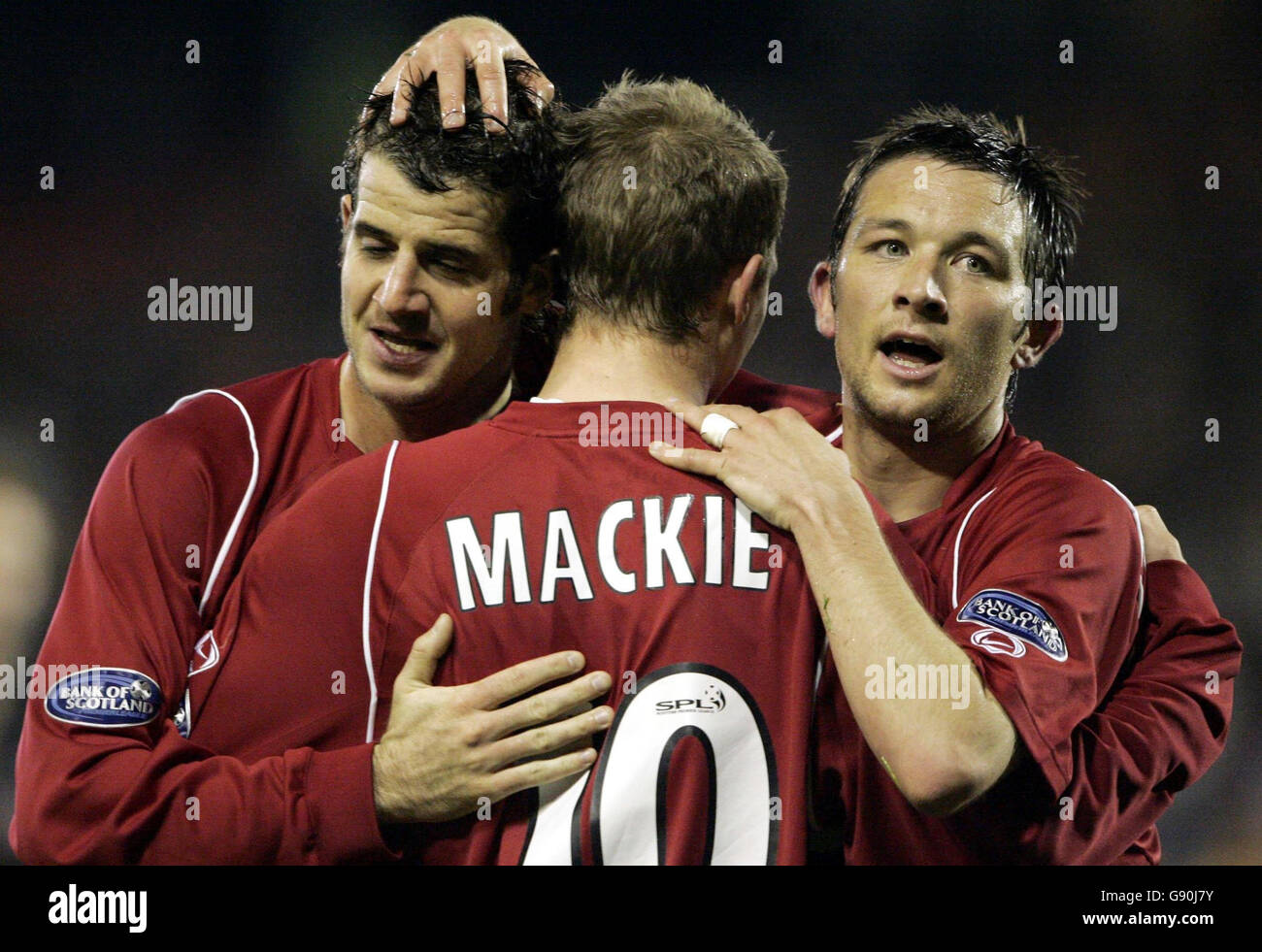 Aberdeen's Stephen Crawford (left) celebrates scoring with teammates Darren Mackie and Barry Nicholson during the Bank of Scotland Premier League match at Pittodrie, Aberdeen, Tuesday October 25, 2005. PRESS ASSOCIATION Photo. Photo credit should read: Andrew Milligan/PA **EDITORIAL USE ONLY** Stock Photo