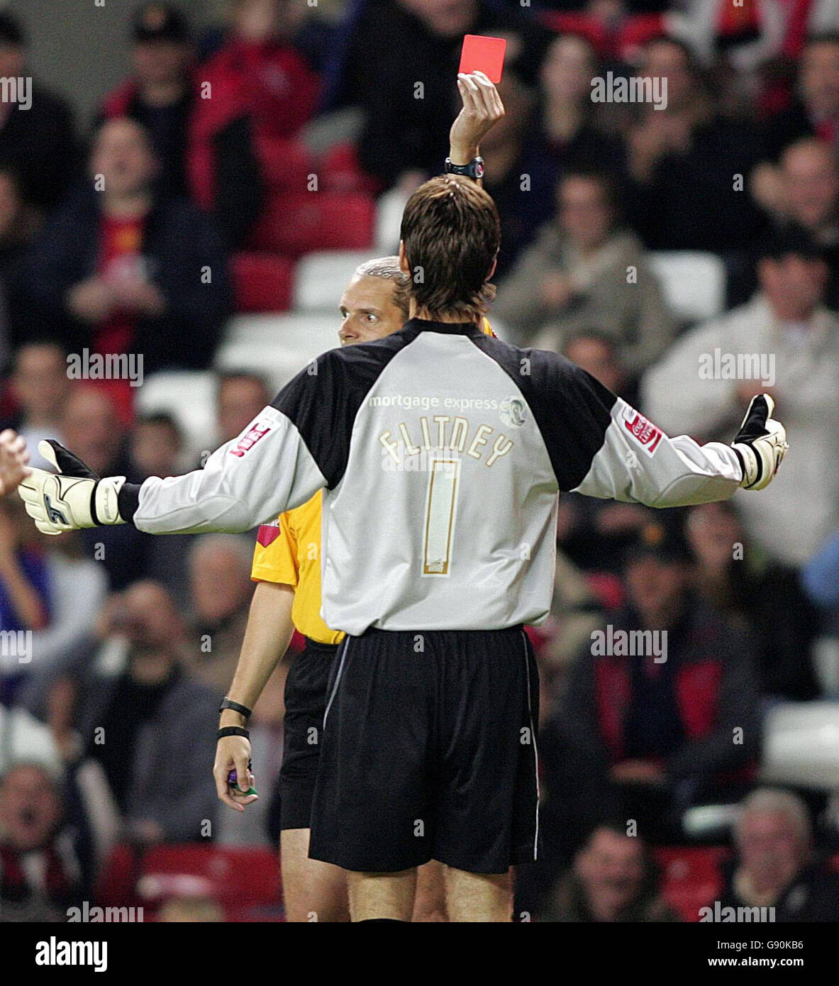 goal keeper Ross Flitney is shown the red card by referee