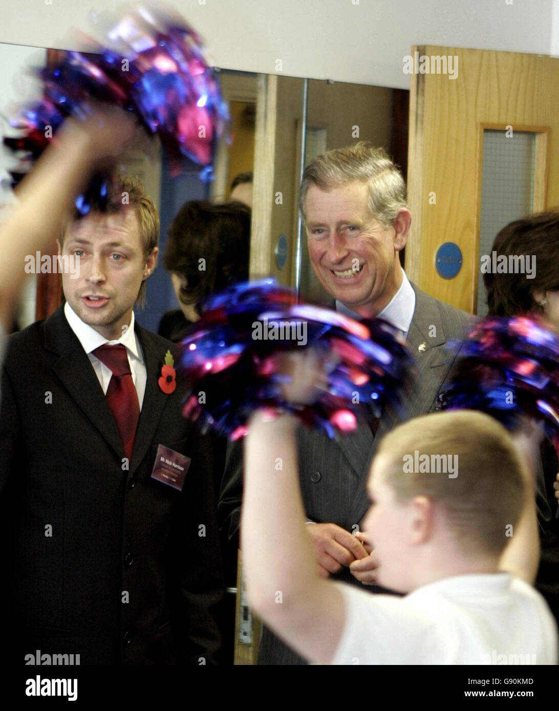 The Prince of Wales smiles as he watches a cheerleading class at Burnley FC in Lancashire, Thursday October 27, 2005. The Prince visited Turf Moor to meet schoolchildren taking part in anti-racism and citizenship activities and will later visit Walton High School in nearby Nelson to hear about the school's XL club which is funded by the Prince's Trust. See PA story ROYAL Charles. PRESS ASSOCIATION photo. Photo credit should read: Phil Noble/PA/WPA Rota. Stock Photo