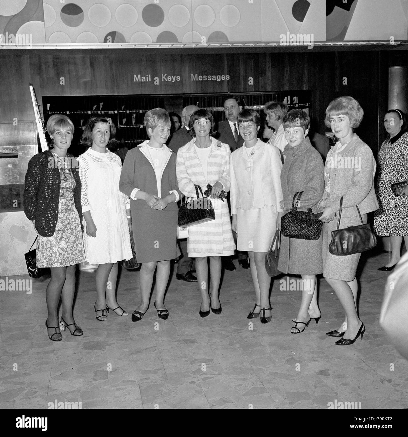 Friends and wives of some of the England players gathered together at the hotel before heading out to watch The Black and White Minstrel Show. (l-r) Miss Leslie Newton (fiancee to Alan Ball), Judith Hurst (wife to Geoff Hurst), Kay Stiles (Nobby Stiles), Norma Charlton (Bobby Charlton), Mrs Wilson (Ray Wilson), Carol Paine (Terry Paine) and Ursula Banks (Gordon Banks). Stock Photo