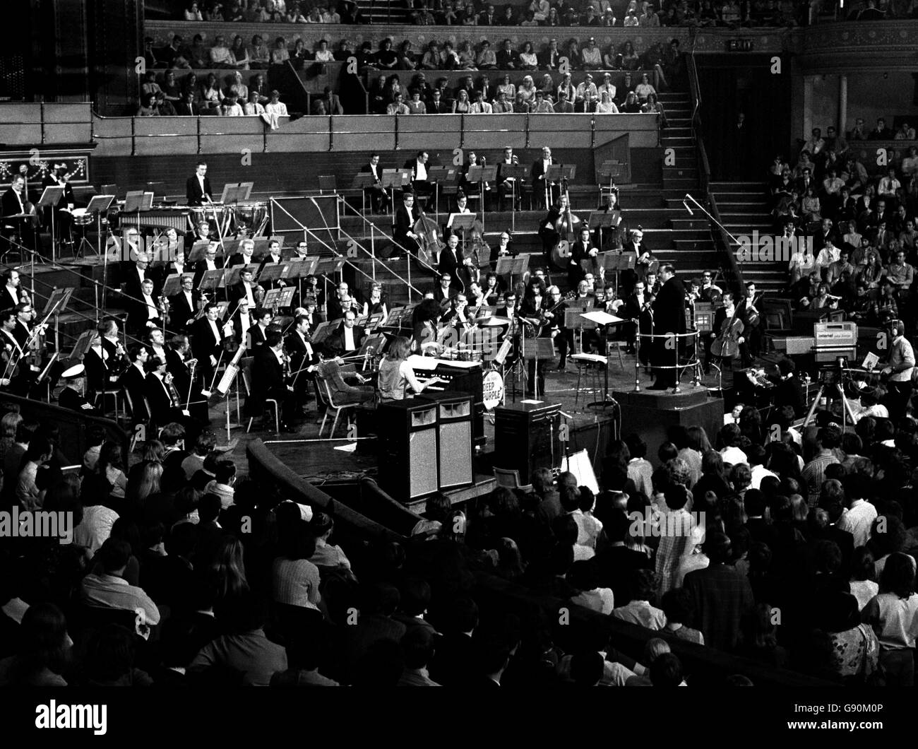 Conductor Malcolm Arnold during the rehearsal conducting Deep Purple's 'Concerto for Group and Orchestra', composed by the group's organist, Jon Lord. The piece will be performed by the group for the time, together with the Royal Philharmonic Orchestra under Mr Arnold's baton at the Royal Albert Hall in aid of Task Force. Stock Photo