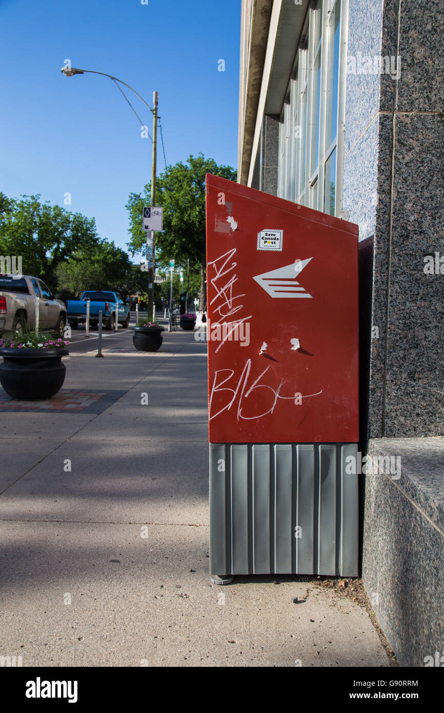 Canada Post mailbox on a sidewalk in downtown Saskatoon, Saskatchewan