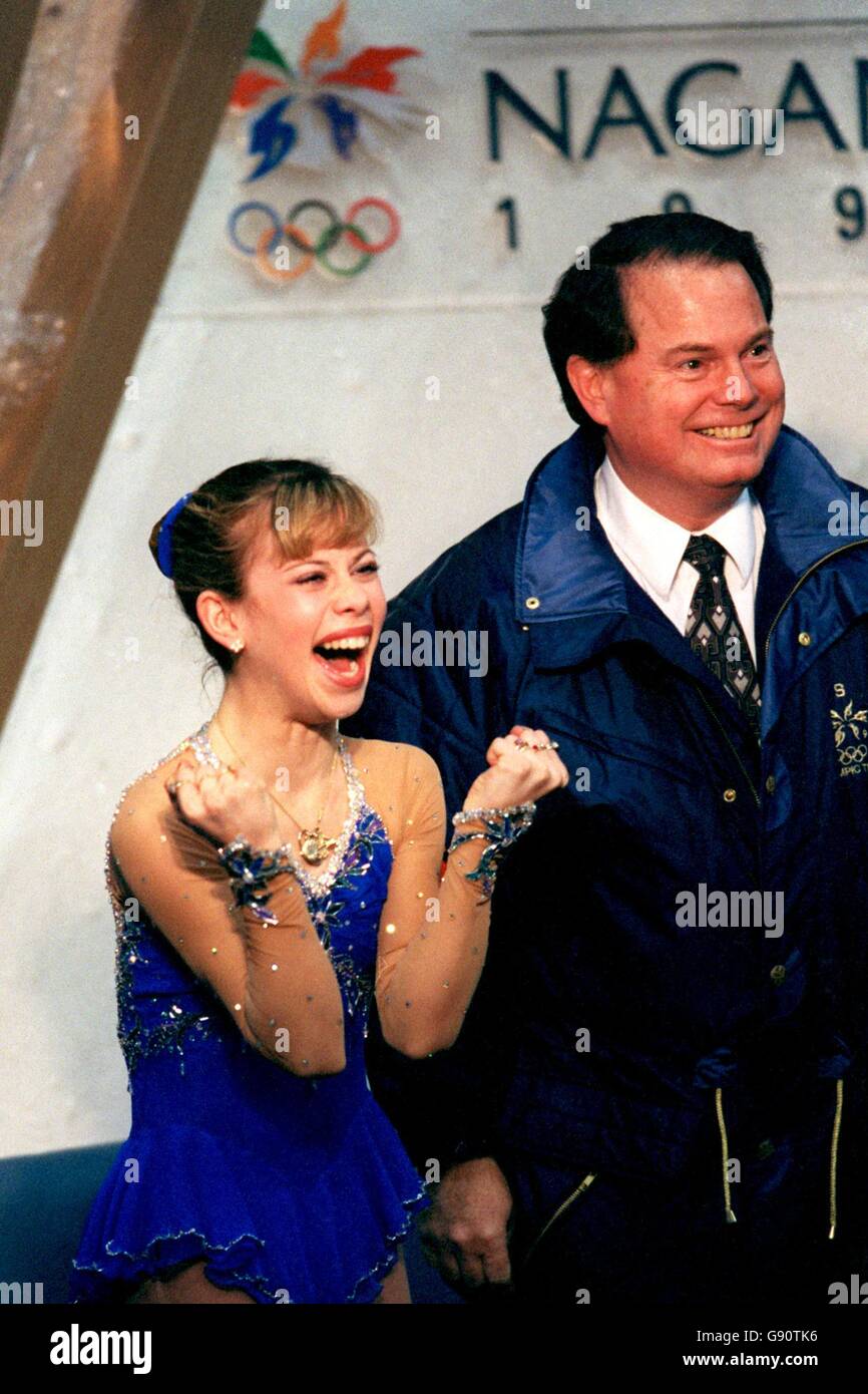 Tara Lipinski, USA, the Gold medal winner, celebrates as she receives