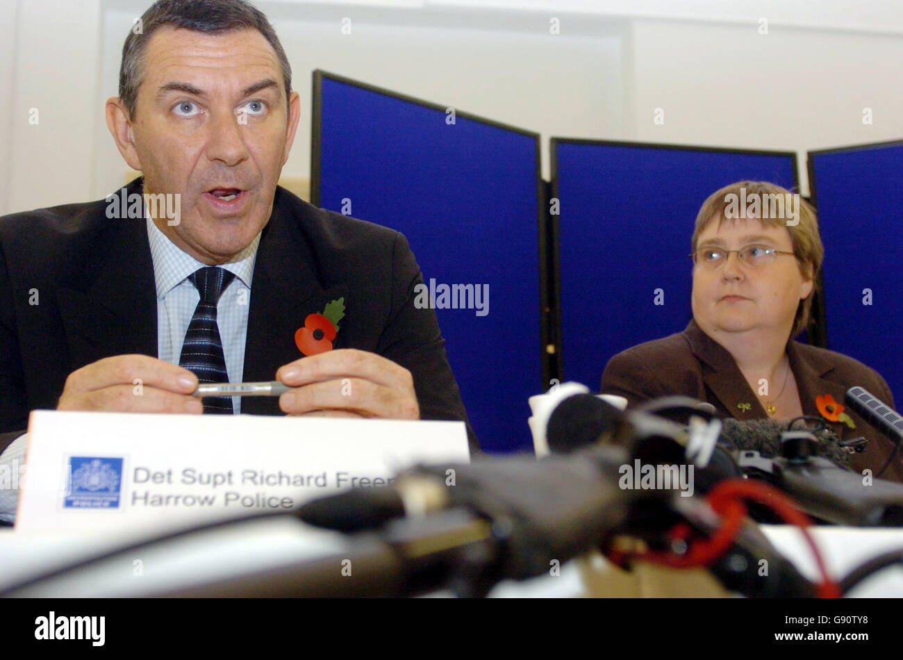 Linda Brady, the wife of Reverend Ian Brady who was stabbed in Stanmore last Tuesday, appears with Detective Superintendent Richard Freeman at a press briefing inside St Anselm's Church Hall in Belmont, Harrow, north-west London, Monday November 7, 2005. Reverend Brady is currently recovering following the attack last week and one man has so far been arrested. PRESS ASSOCIATION Photo. Photo Credit should read: Johnny Green/PA. Stock Photo