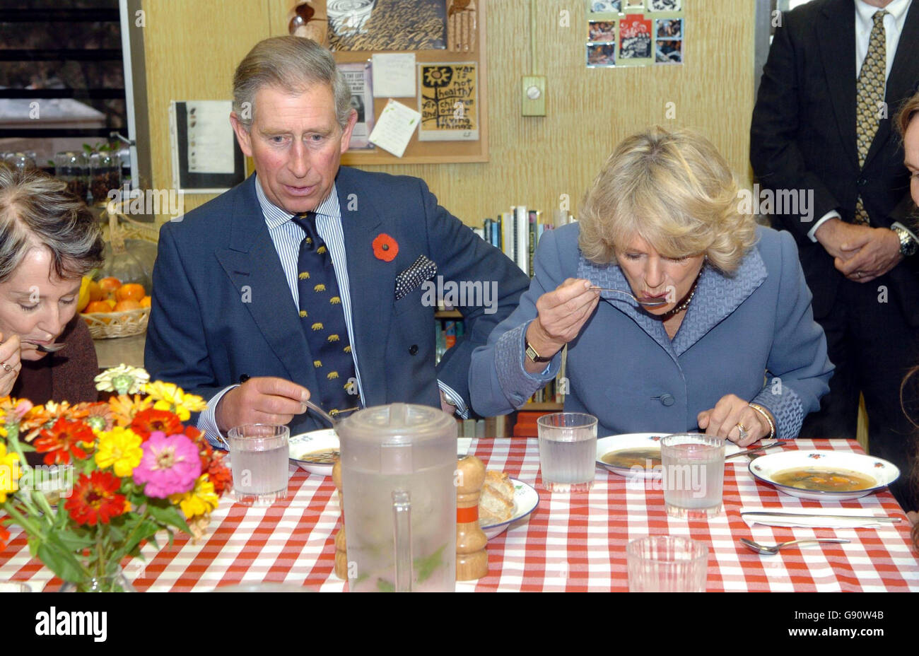 The Prince of Wales and the Duchess of Cornwall enjoy Autumn Harvest Soup in the kitchen of the Edible School Yard in Berkeley, San Francisco. Stock Photo