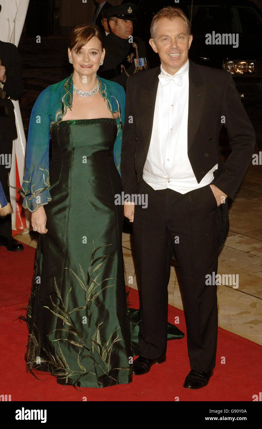 Prime Minister Tony Blair and his wife Cherie arrive for the Lord Mayor