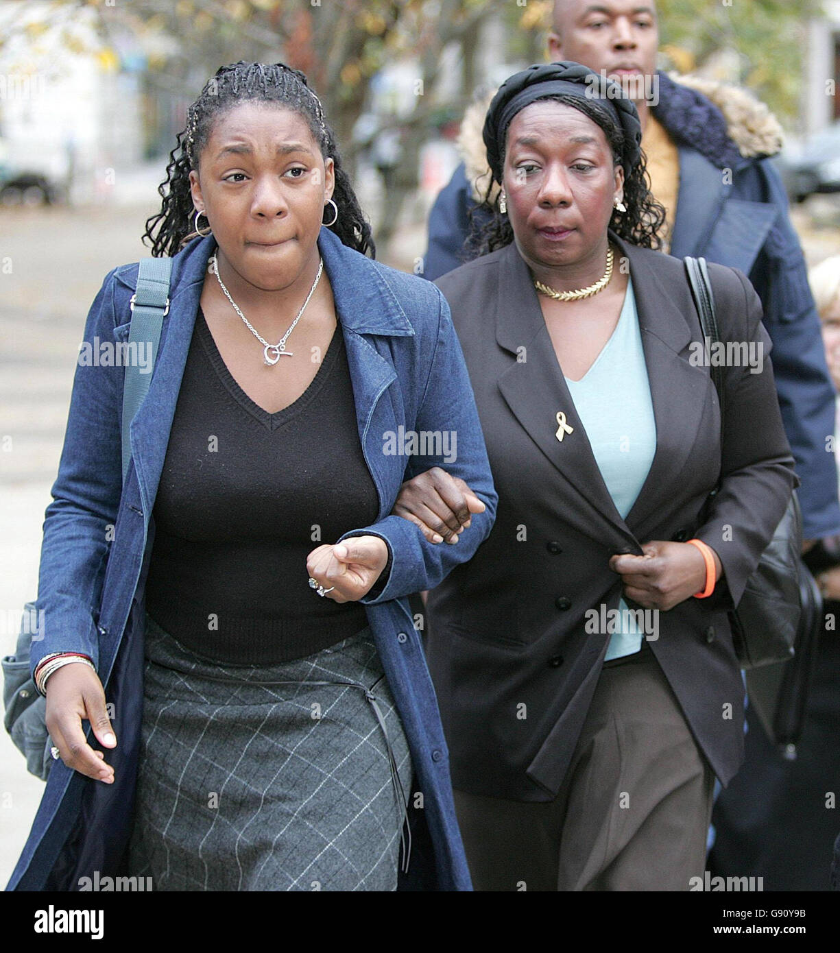 Gee Verona-Walker (Right), mother of Anthony Walker, arrives at Liverpool Crown Court with family members, Tuesday November 15 2005, where the two men accused of bludgeoning Anthony Walker to death with an axe go on trial. Paul Taylor and Michael Barton, aged 20 and 17, allegedly attacked the 18-year-old in July as he walked through Huyton, Merseyside, with his girlfriend and cousin. See PA story COURTS Axe. PRESS ASSOCIATION Photo. Photo credit should read: Martin Rickett/PA Stock Photo