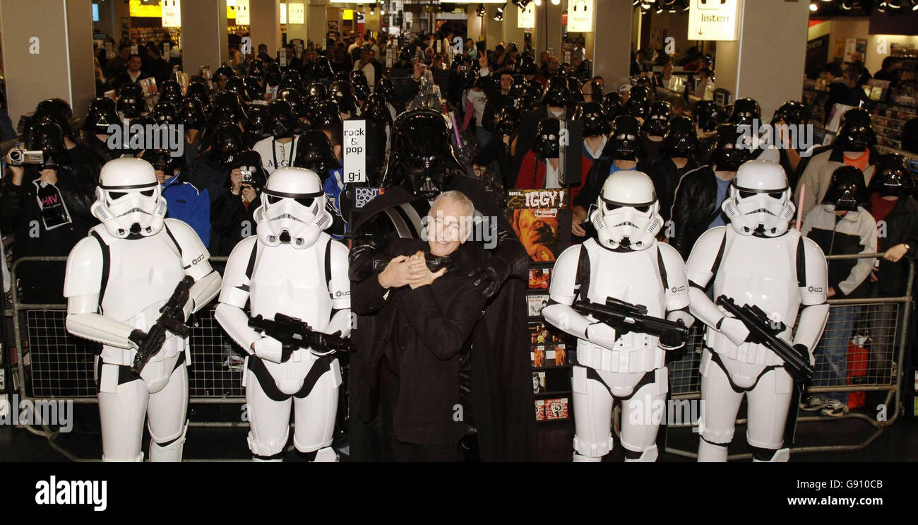 Anthony Daniels (C3-PO, centre) during a photocall to mark the launch of the new Star Wars DVD, 'Episode III: Revenge Of The Sith' and the Star Wars 'Battlefront II' video game, at the Oxford Street HMV, central London. Stock Photo