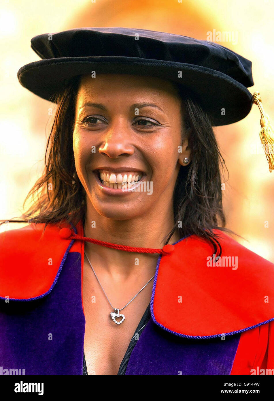 Dame Kelly Holmes, the double Olympic gold medal winner, wearing a cap and gown before receiving her honorary degree as Doctor of Civil Law, at Rochester Cathedral Wednesday November 16, 2005. The degree was awarded to her by the University of Kent, her home county, at a ceremony for 140 graduates. See PA story EDUCATION Holmes. PRESS ASSOCIATION Photo. Photo credit should read: John Stillwell/PA Stock Photo