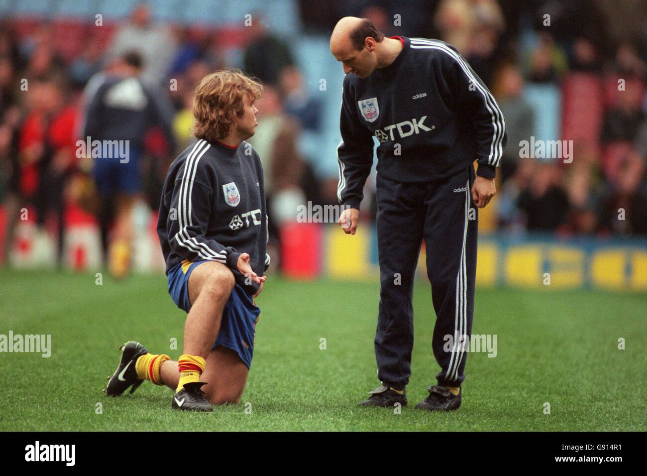 Crystal Palace player-manager Attilio Lombardo (right) talks to his  assistant Thomas Brolin (left) as they warm up before the match Stock Photo  - Alamy