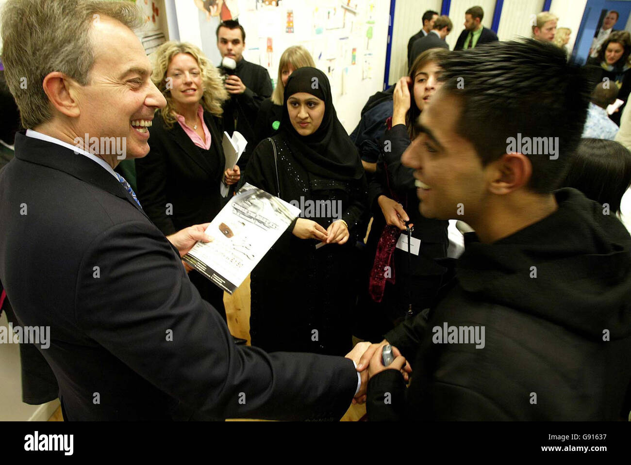 Britain's Prime Minister Tony Blair speaks with students during a visit to Little London Community Primary School in Leeds Thursday November 17, 2005. Watch for PA story POLITICS Blair. PRESS ASSOCIATION Photo. Photo credit should read: Owen Humphreys/WPA rota/PA Stock Photo