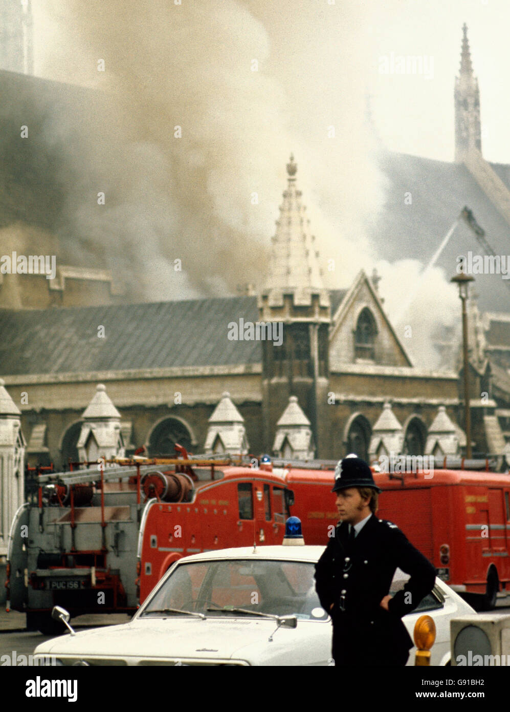 Smoke billows from the Westminster Hall after an IRA device exploded. Stock Photo