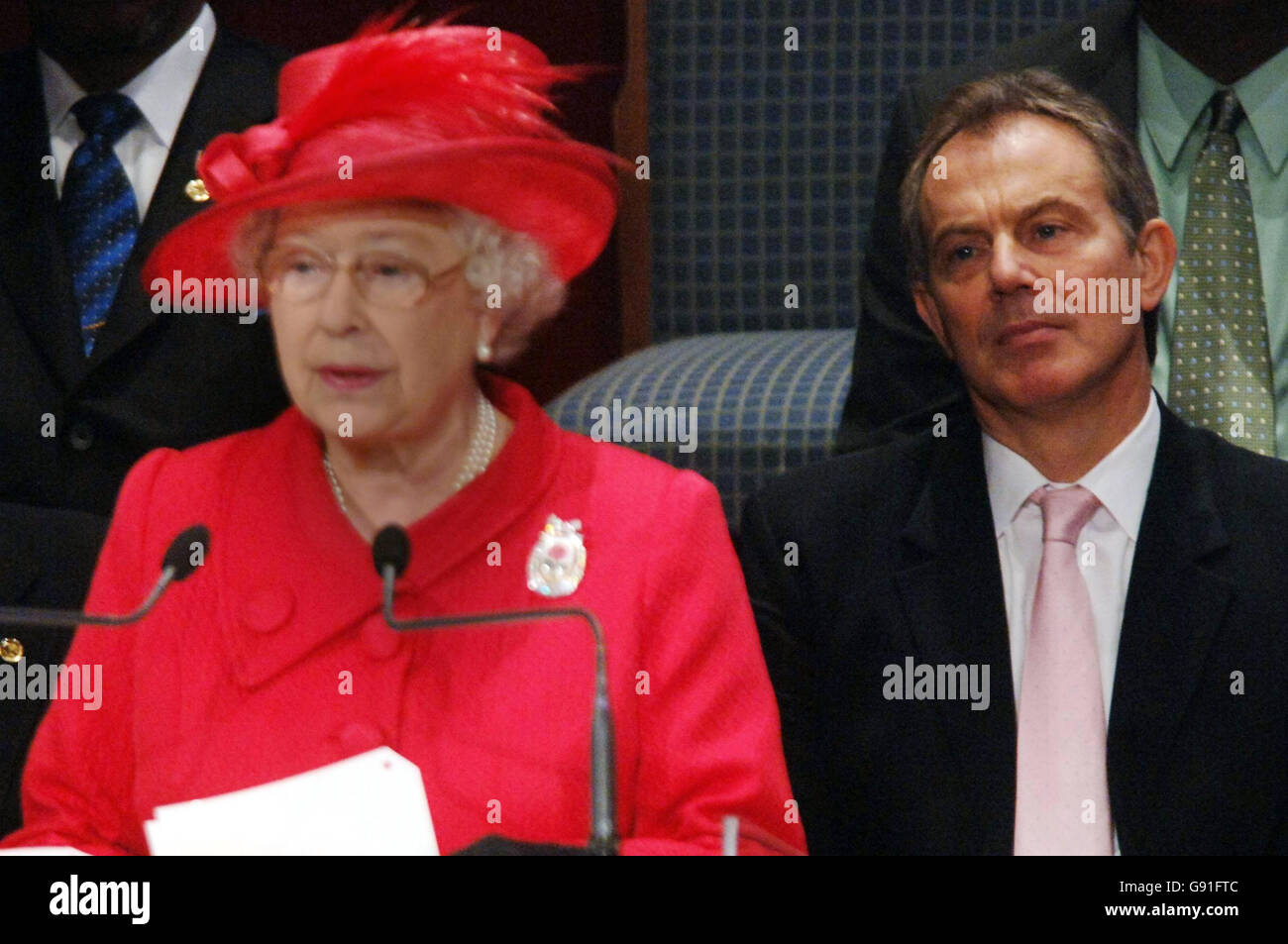 Britain's Queen Elizabeth II addresses the Commonwealth Head of Governments Meeting in Valletta, Malta, as Britain's Prime Minster Tony Blair listens (right). Stock Photo