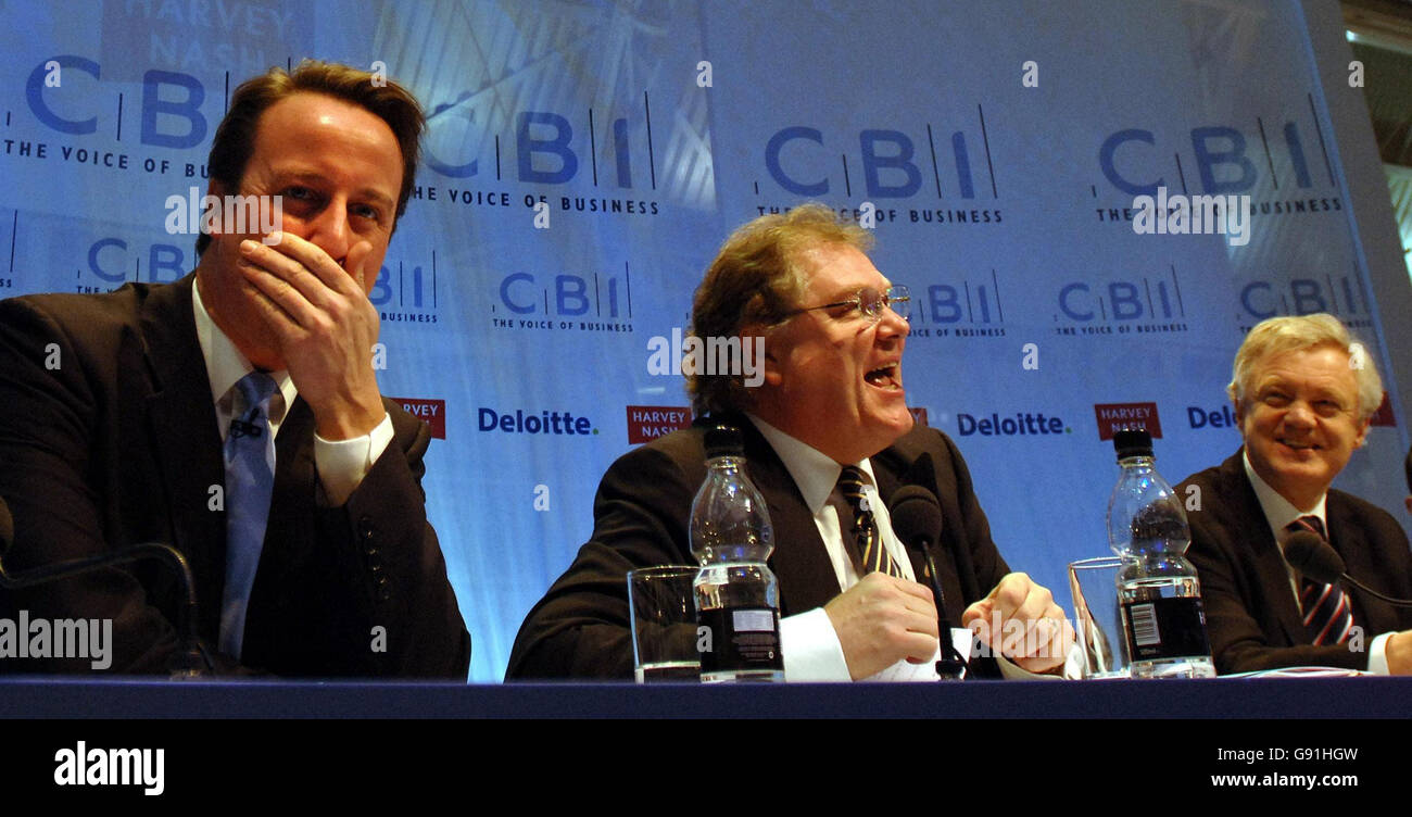 Conservative party leadership rivals David Cameron (left), David Davis (right) and CBI Director General Digby Jones during the annual Confederation of British Industry conference in central London, Monday November 28, 2005. See PA story POLITICS CBI. PRESS ASSOCIATION Photo. Photo credit should read: Matthew Fearn/PA Stock Photo