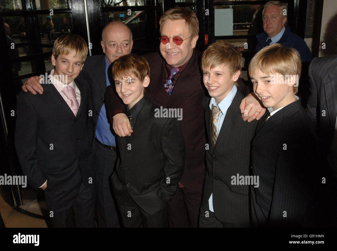 Sir Elton John (centre) and actor Tim Healy are joined by four young performers who are playing Billy Elliot in the stage show (left-right) James Lomas, Leon Cooke, George McGuire, and Liam Mower at the 51st Evening Standard Theatre awards held at the Savoy Hotel in central London. See PA story SHOWBIZ Awards. PRESS ASSOCIATION Photo. Photo Credit should read: Steve Parsons/PA. Stock Photo