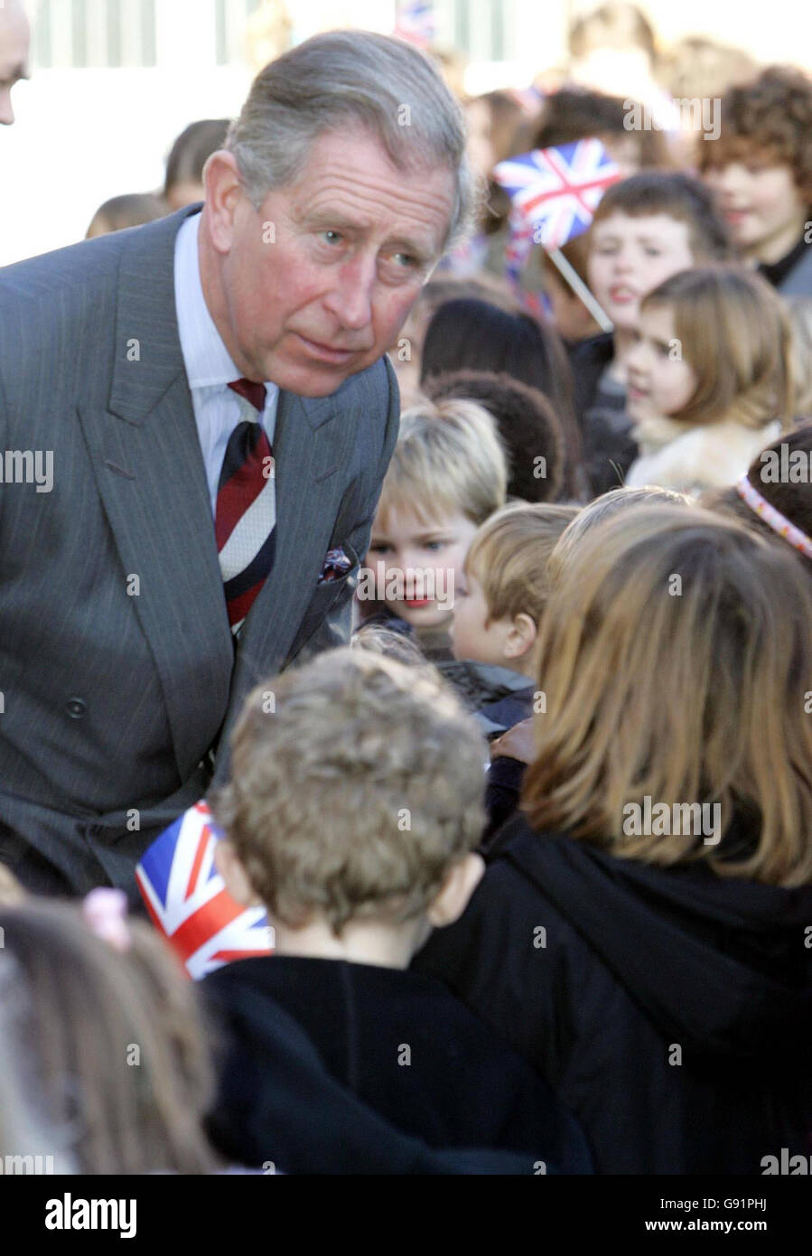 The Prince of Wales during a visit to Hotwells Primary School, Bristol, Monday December 12, 2005. The Prince today visited the pioneering Bristol primary school which produces its own organic meals. The school encourages children to grow their own fruit and vegetables in the school's garden . These fresh, home-made goodies are then used as ingredients for the youngsters' school dinners. See PA story ROYAL Charles. PRESS ASSOCIATION Photo. Photo credit should read: Tim Ockenden/WPA Rota/PA. Stock Photo