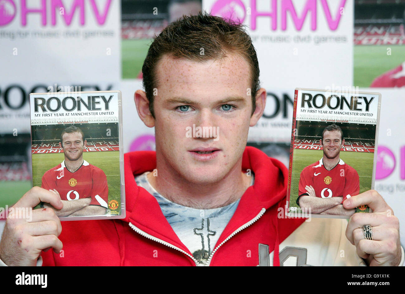 Manchester United's Wayne Rooney launches his new DVD at HMV, Manchester, Wednesday November 23, 2005. The DVD called 'Rooney: My First Year At Manchester United' shows a candid insight into the professional life of one of the world's top players. See PA story SOCCER Rooney, PRESS ASSOCIATION Photo. Photo credit should read: Martin Rickett/PA. Stock Photo