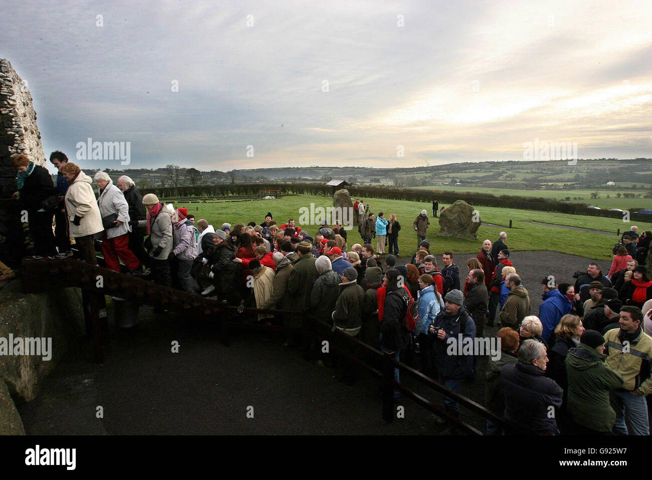 Hundreds gather at Newgrange Neolithic Tomb in County Meath, Wednesday December 21, 2005, for the annual December 21st solstice. It is thought the Neolithics built Newgrange over 5,000 years ago so that the sun shone on the ashes of their dead in the tomb, representing a sign of rebirth. See PA Story NATURE Solstice. PRESS ASSOCIATION Photo. Photo credit should read: Niall Carson/PA Stock Photo
