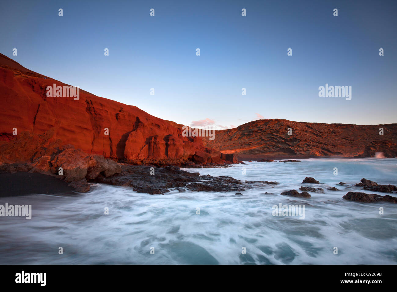 Red cliffs El Golfo Lanzarote, Canary Islands Stock Photo