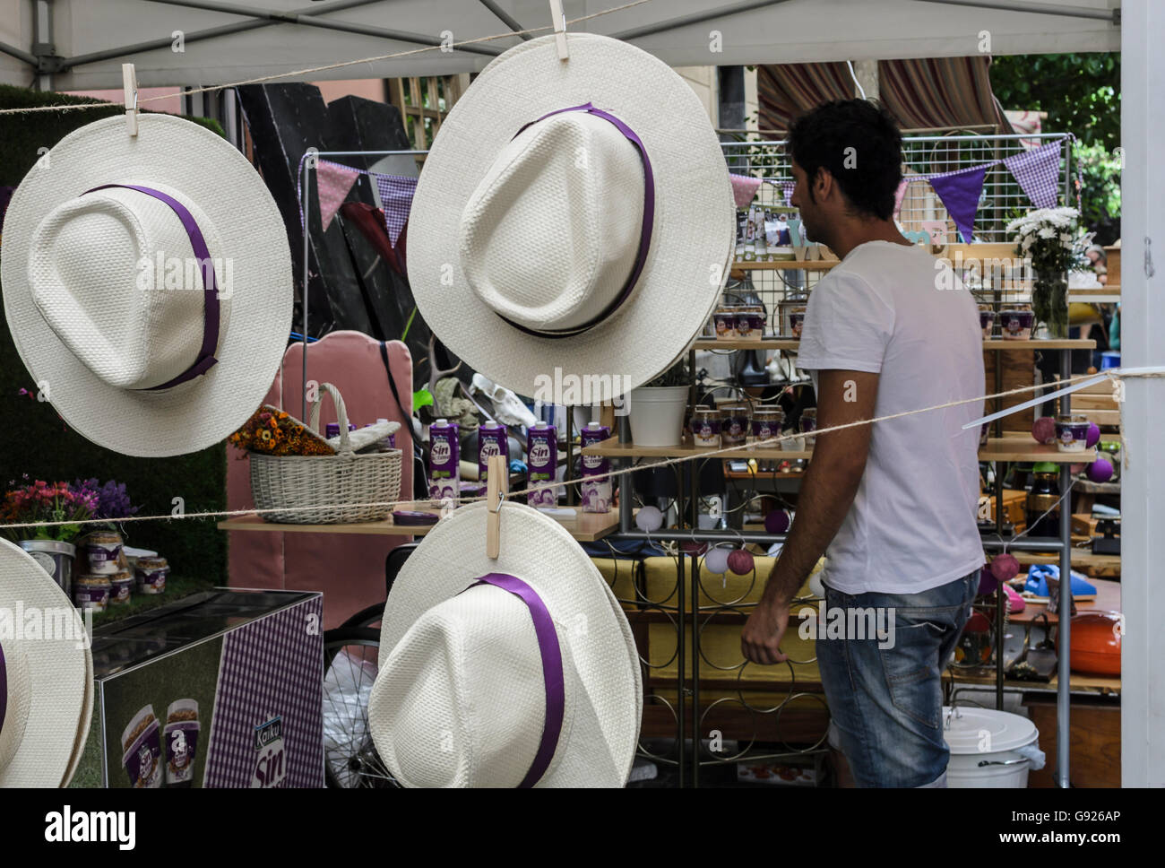 Madrid, Spain, 12 st June 2016.  A wall street view with decoration items and hats in DecorAccion Market, Letters Quarter, Madri Stock Photo