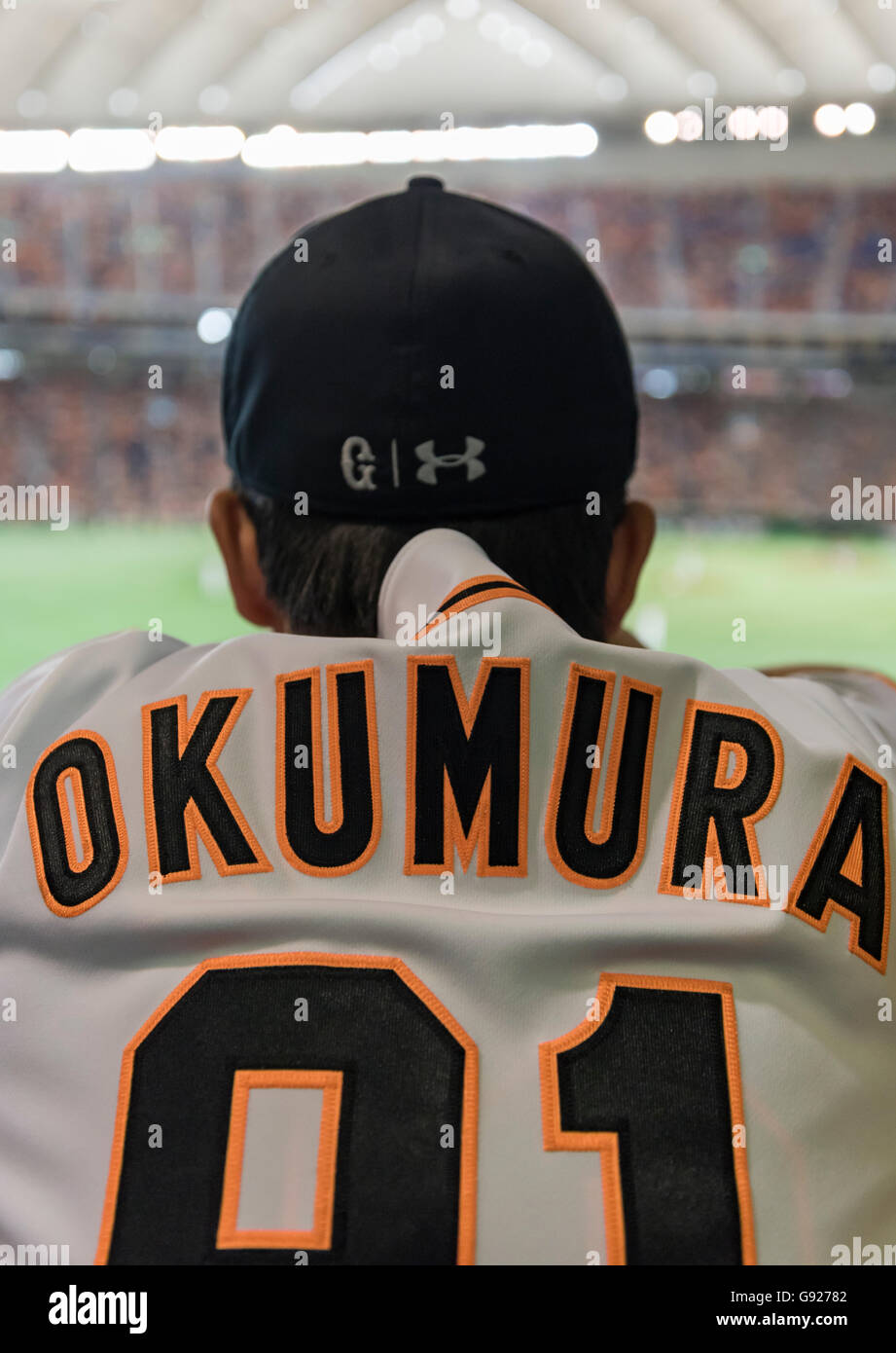 Supporter of Yomiuri Giants baseball team at Tokyo Dome stadium, Japan Stock Photo