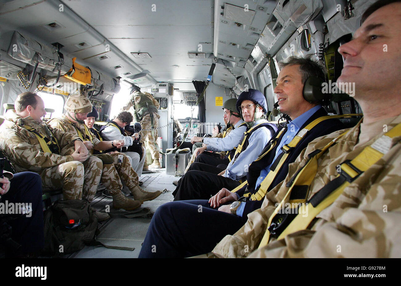 British Prime Minister Tony Blair, 2nd right, is transported in a Royal Air Force Merlin helicopter to Shaibah Logistics Base in Basra, Iraq. Stock Photo