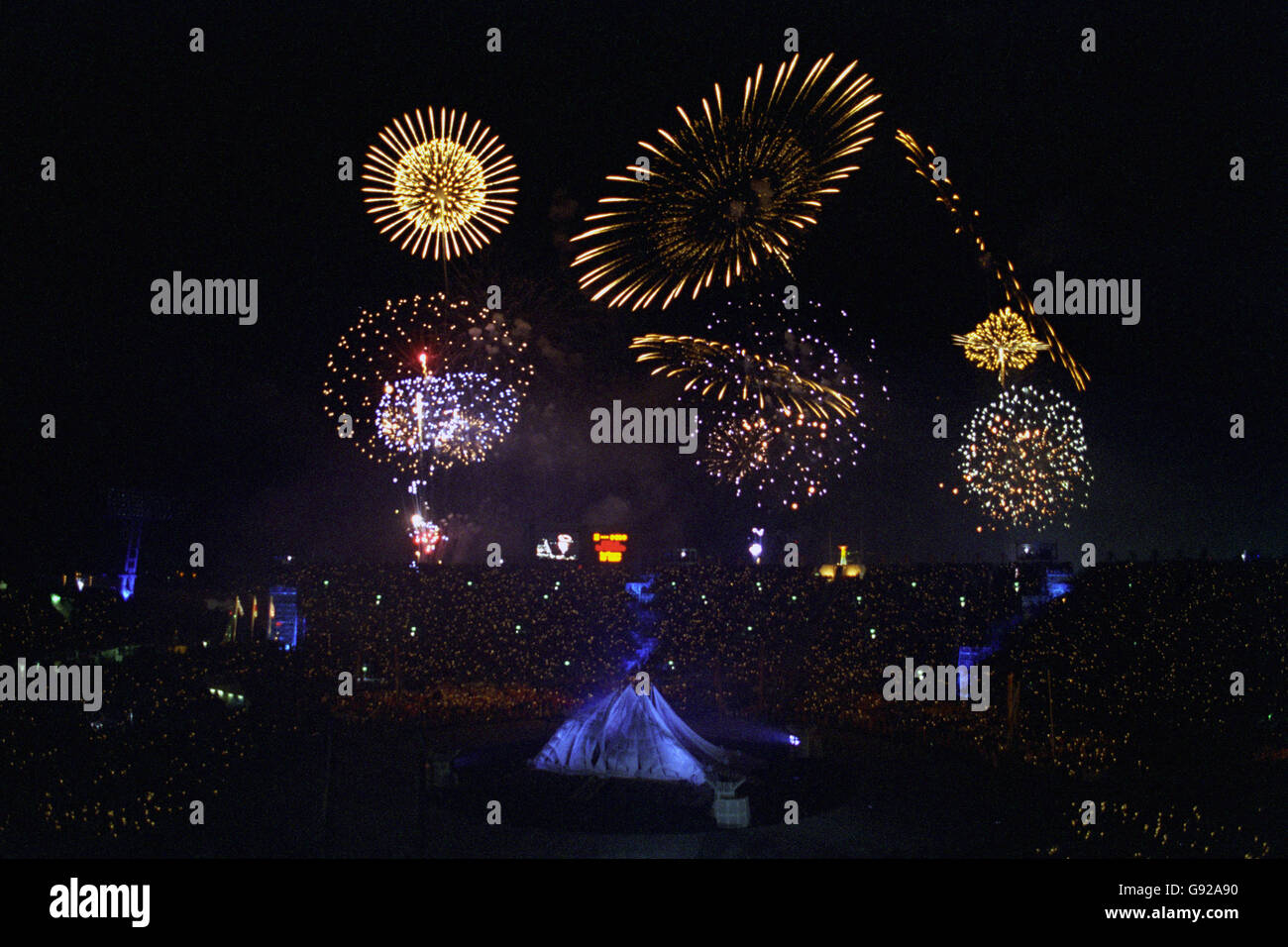Fireworks explode in the night sky as the Winter Olympic Games draw to a close Stock Photo