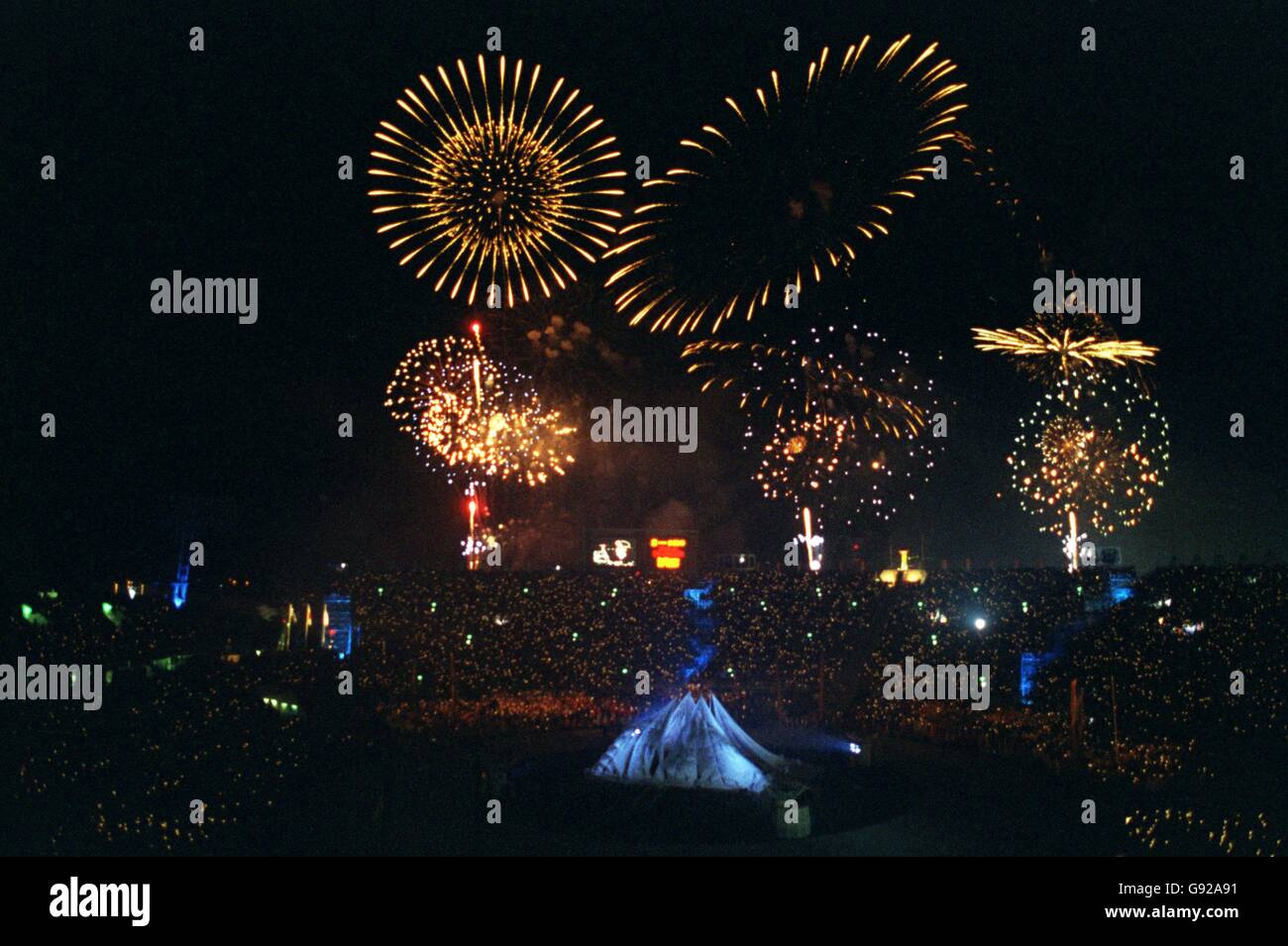 Fireworks explode in the night sky as the Winter Olympic Games draw to a close Stock Photo