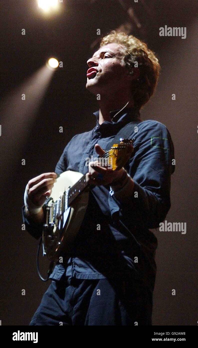 Chris Martin of Coldplay performs on stage as part of their UK tour at Earls Court, west london, Wednesday 14 December 2005. PRESS ASSOCIATION Photo. Photo credit should read: Joel Ryan/PA Stock Photo