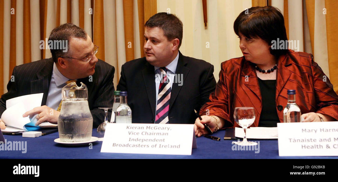 Michael Patten (left) chairman of the Drinks Industry Group of Ireland and Kieran McGeary vice chairman of Independant Broadcasters of Ireland speak to the Tanaiste Mary Harney at the launch of Ireland's new Alcohol advertising monitoring body established to ensure industry compliance with new voluntary codes of practice in relation to the exposure of young people to alcohol, at the Alexander Hotel in Dublin, Thursday 15 December, 2005. See PA story POLITICS Alcohol. PRESS ASSOCIATION Photo. Photo credit should read: Niall Carson/PA Stock Photo