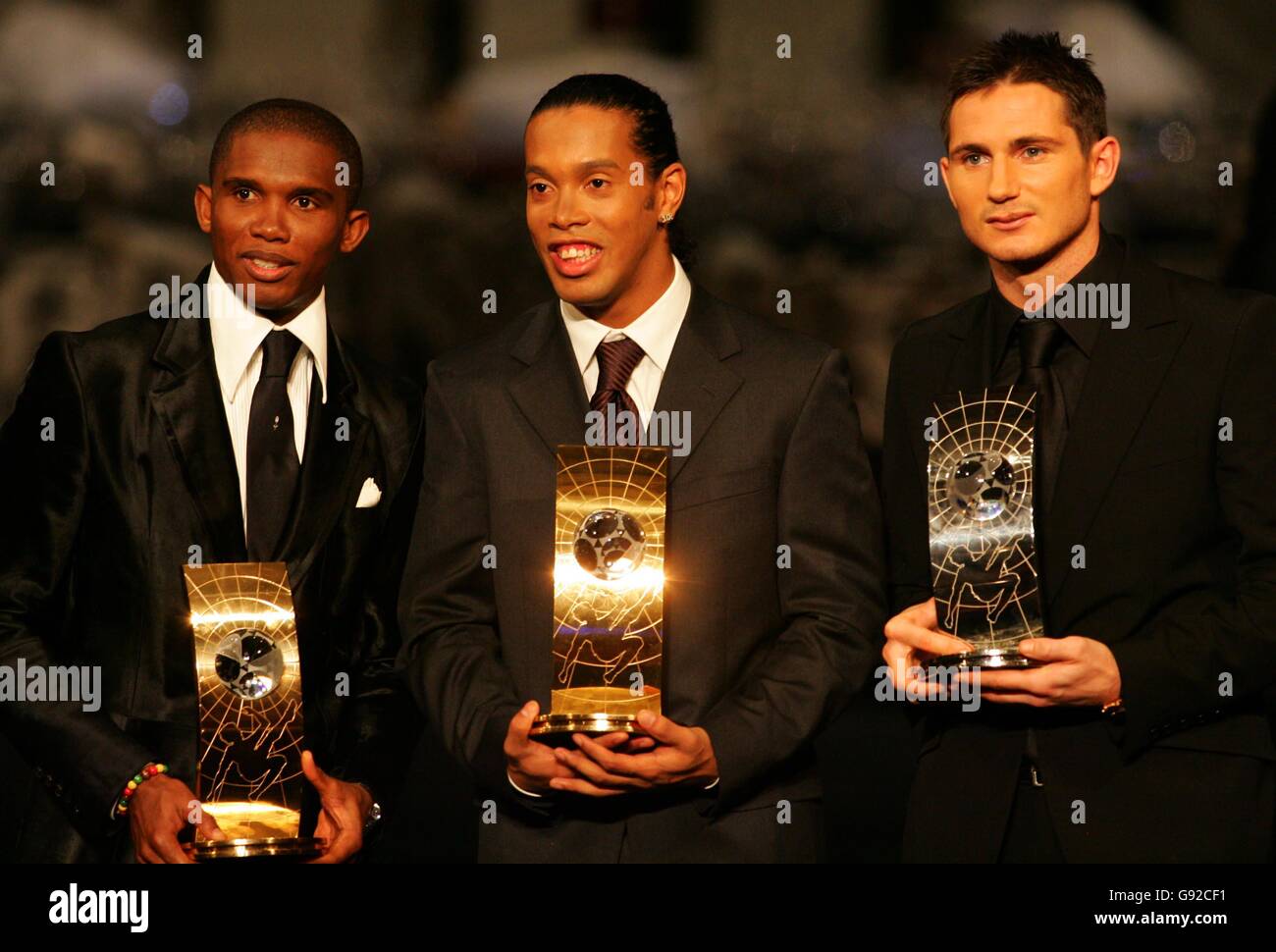 L-R: Samuel Eto'o, winner Ronaldinho and second place Chelsea's Frank Lampard with their awards Stock Photo