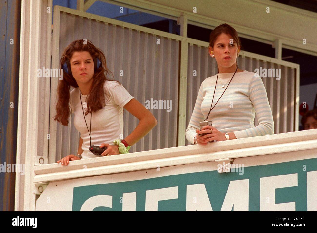 Formula One Motor Racing - Monaco Grand Prix - Qualifying. Girls watch from the pit lane Stock Photo