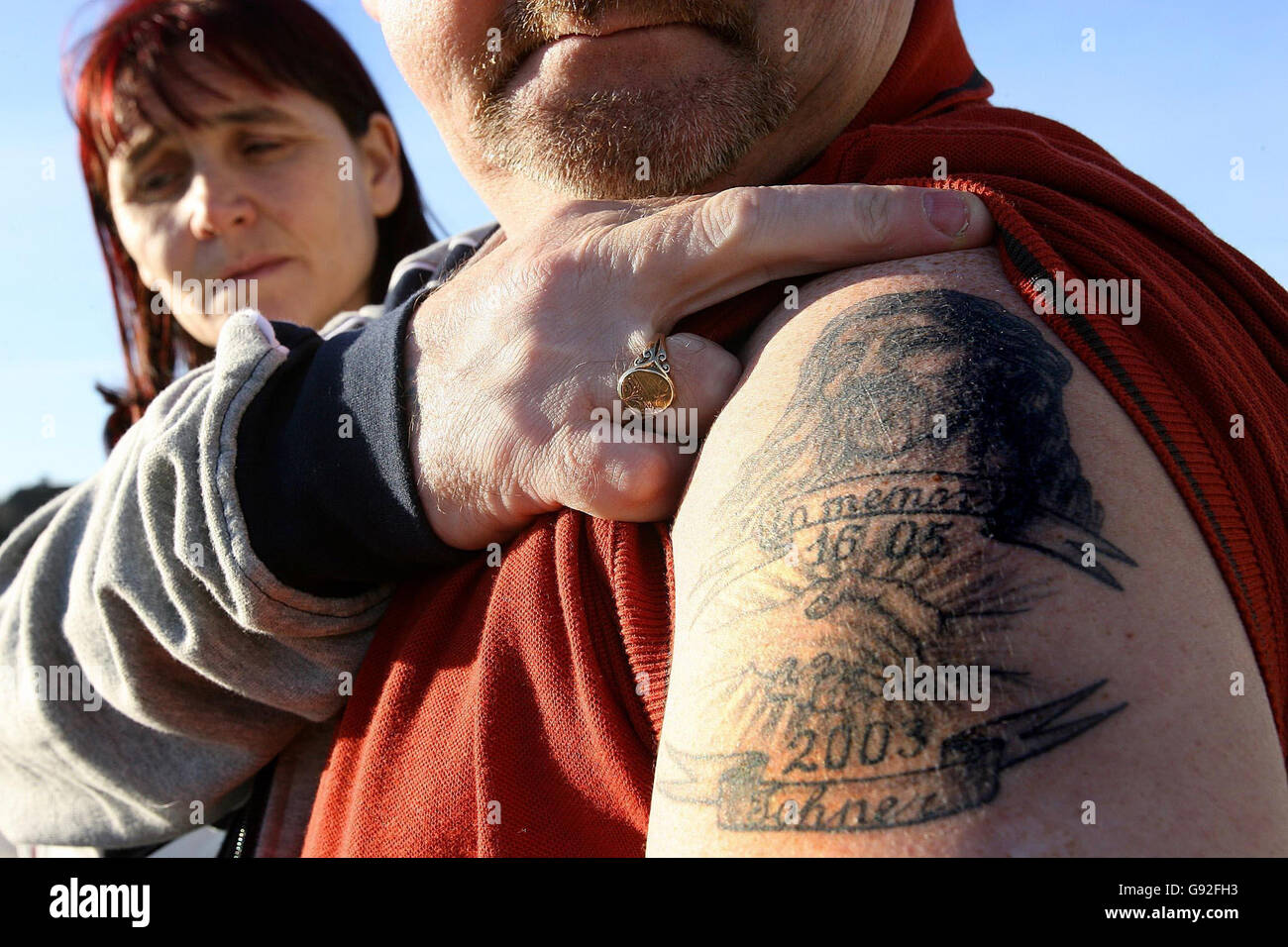 John and Sandra Maloney at the grave of their teenage son John 'Johner