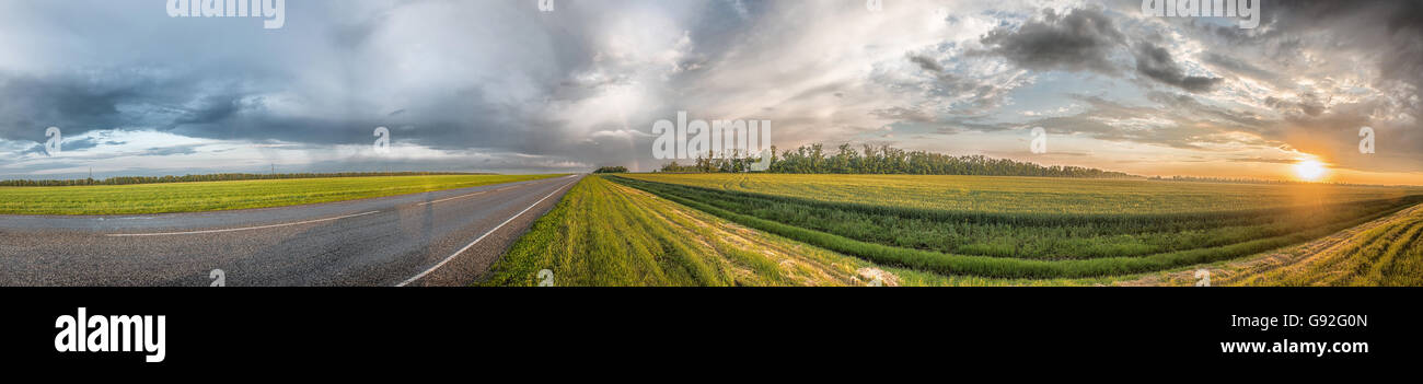 rainbow after the rain background landscape Stock Photo - Alamy