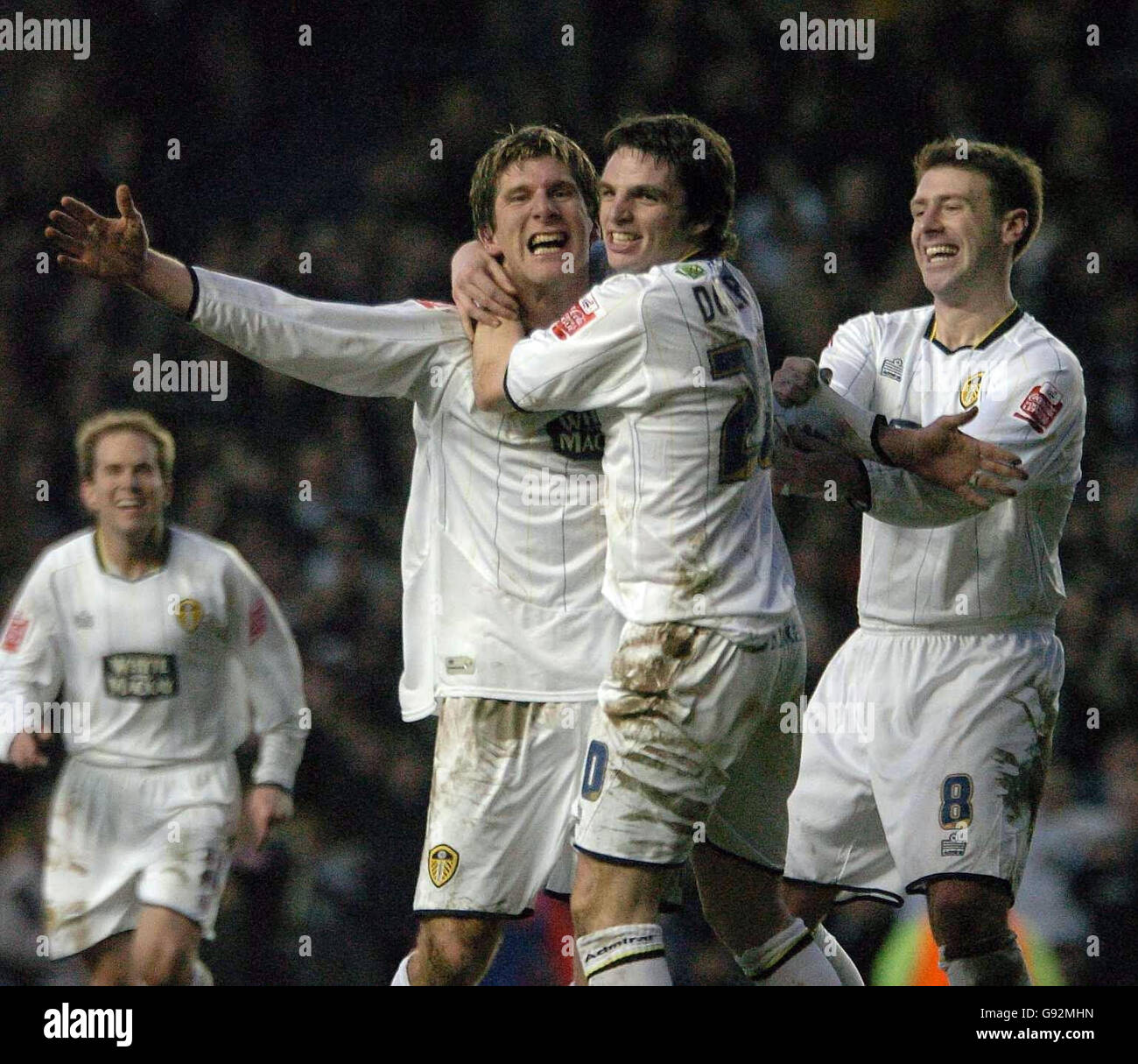 Leeds United's Richard Cresswell (L) celebrates scoring the second goal against Sheffield Wednesday with team-mates Jonathan Douglas (C) and Sean Gregan during the Coca-Cola Championship match at Elland Road, Leeds, Saturday January 21, 2006. PRESS ASSOCIATION Photo. Photo credit should read: John Jones/PA NO UNOFFICIAL CLUB WEBSITE USE. Stock Photo