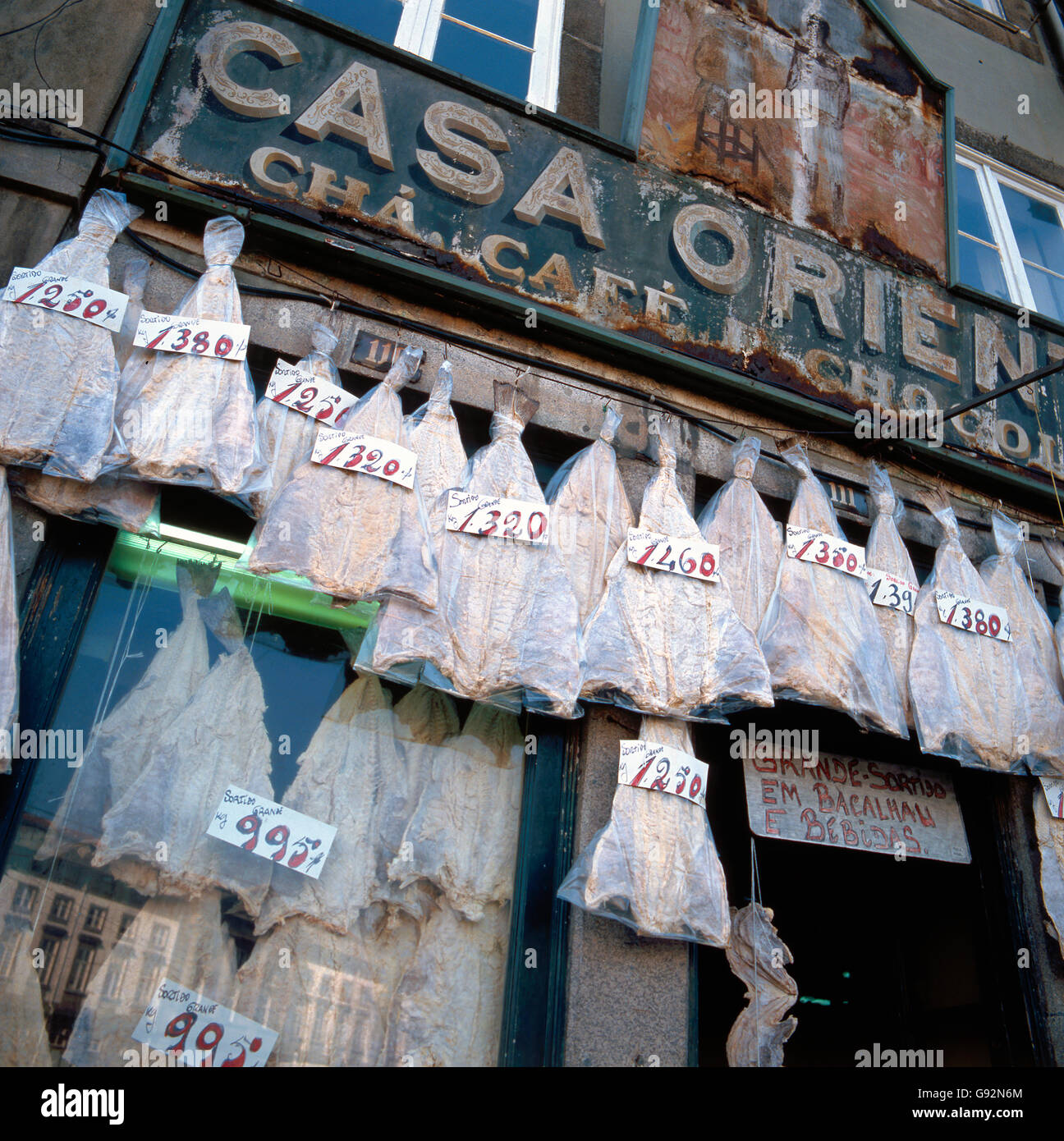 Old fashioned bacalhau shop in Porto, Portugal. Bacalhau is the Portuguese word for salted codfish Stock Photo