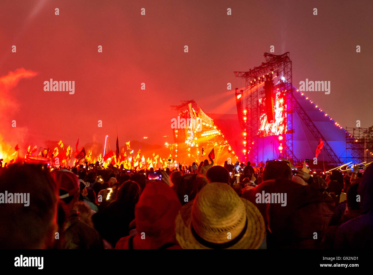 Coldplay on the Pyramid Stage at The 2016 Glastonbury Festival of Contemporary Performing Arts. Stock Photo