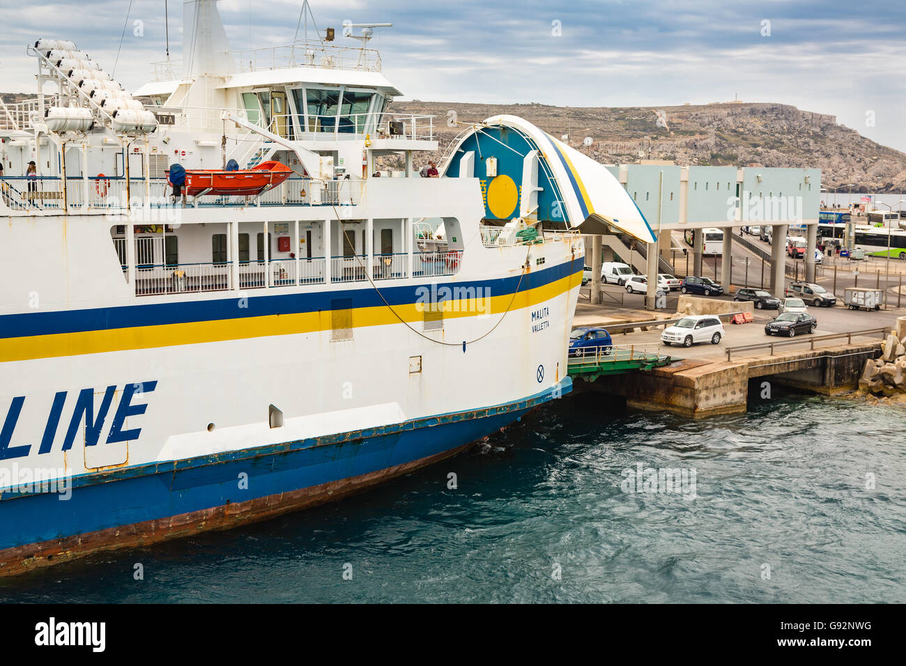 Cirkewwa, Malta - May 06, 2016: Ferries between the islands of Malta and Gozo transports people and cars shuttle system. Stock Photo