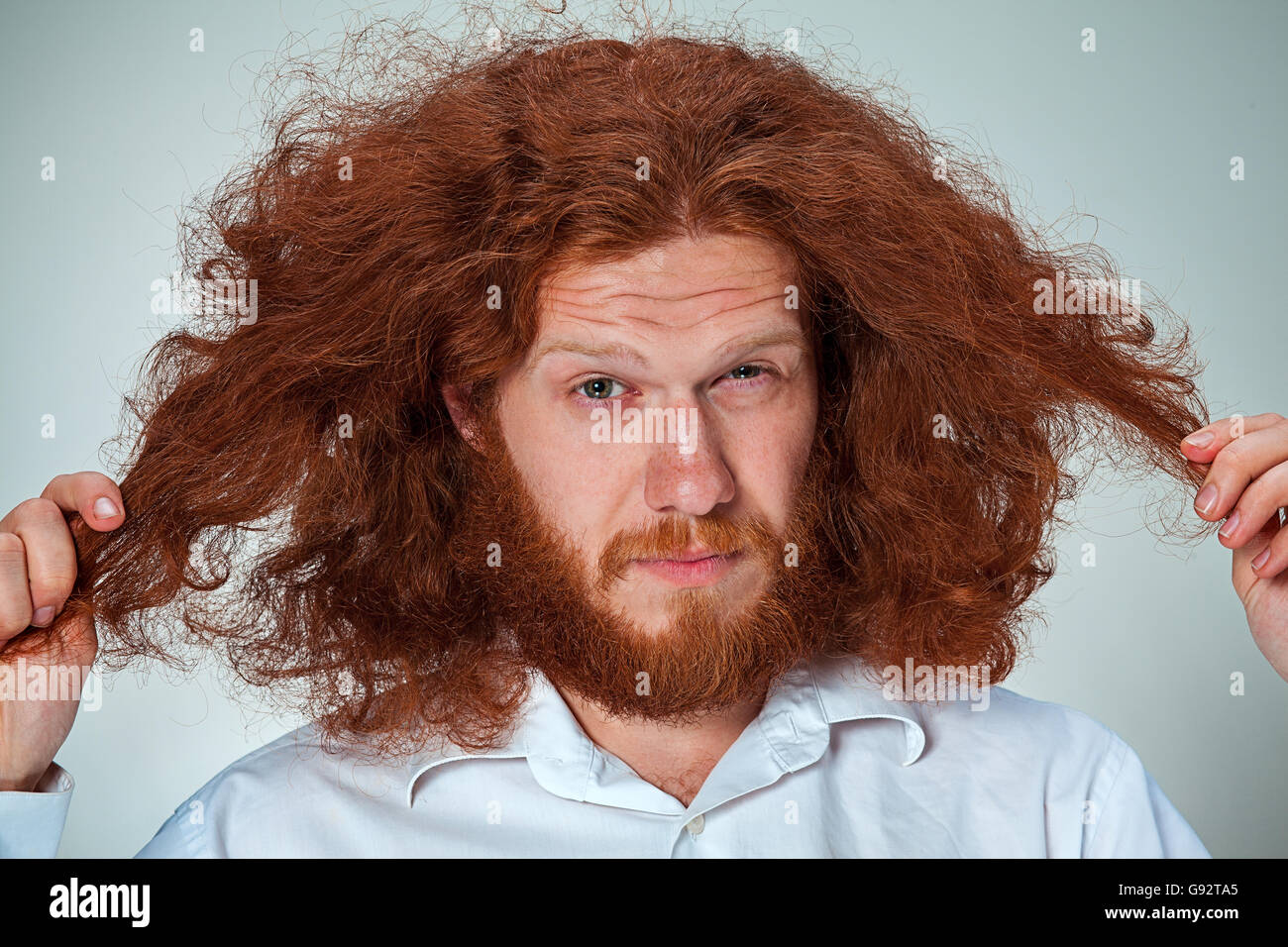 The young man looking at camera Stock Photo - Alamy