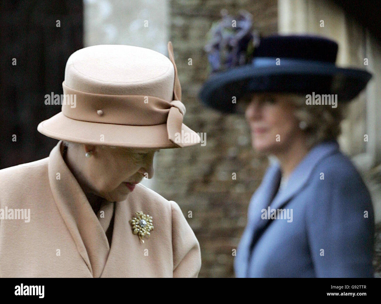 Britain's Queen Elizabeth II (left) and The Duchess of Cornwall leave St Mary Magdalene's Church after the Royal Family's Christmas Day service on the Sandringham estate in Norfolk, Sunday December 25, 2005.S ee PA story ROYAL Church. PRESS ASSOCIATION Photo. Photo credit should read: Toby Melville/Reuters/WPAl/PA. Stock Photo