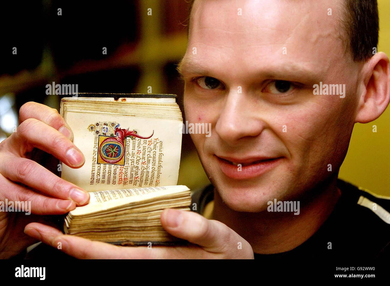 Alex Moseley from Leicester University, Wednesday December 21 2005, with one of many 15th century books that inspired the typeface design for the Daily Prophet newspaper which is featured in the Harry Potter movie. Mr Moseley, principal computer officer at Leicester University and a keen medieval researcher, used his dual expertise to conjure up writing styles for the Book of Monsters, ancient text in Moste Potente Potions and parts of the Marauder's Map. See PA story SHOWBIZ Potter. PRESS ASSOCIATION PHOTO. Picture credit should read: Rui Vieira/PA Stock Photo