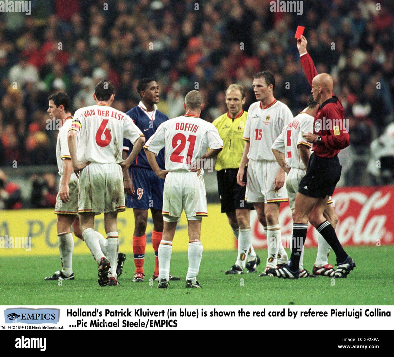 Patrick Kluivert blue) is shown the red card by Pierluigi Collina (right Stock Photo - Alamy