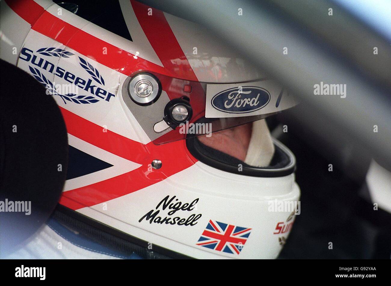 Nigel Mansell sits in his Ford Mondeo waiting for the race to start Stock Photo
