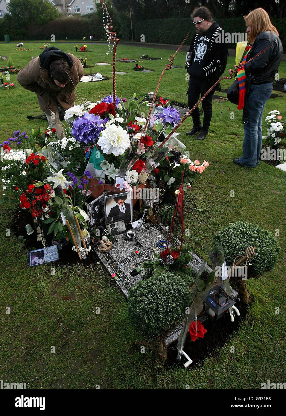 Fans gather at Phil Lynott's grave in St Fintan's cemetery in Sutton, Dublin. Today marks the 20th anniversary of the death of the rock star. Stock Photo
