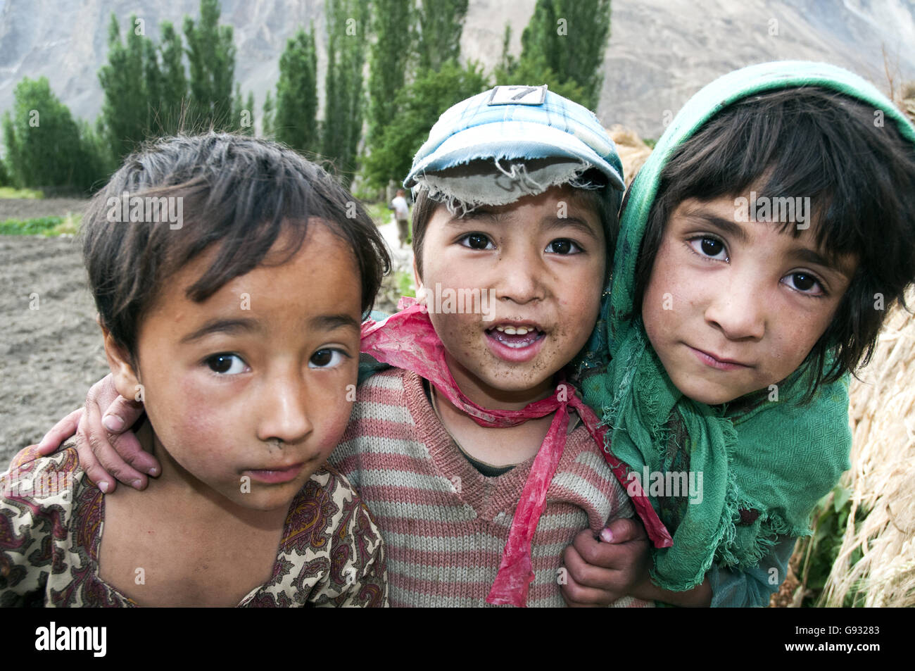 Children at Turtuk, a Balti village in the Nubra Valley near the Indo-Pakistan ceasefire line. The Balti are a Central Asian Mus Stock Photo