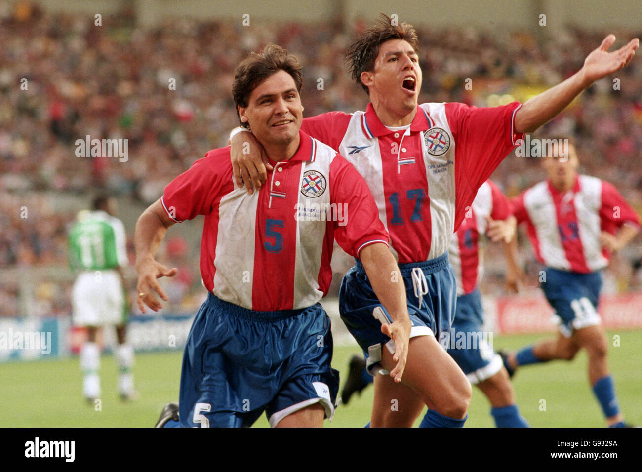 Paraguay's Celso Ayala (left) celebrates scoring the opening goal with teammate Hugo Brizuela (right) Stock Photo