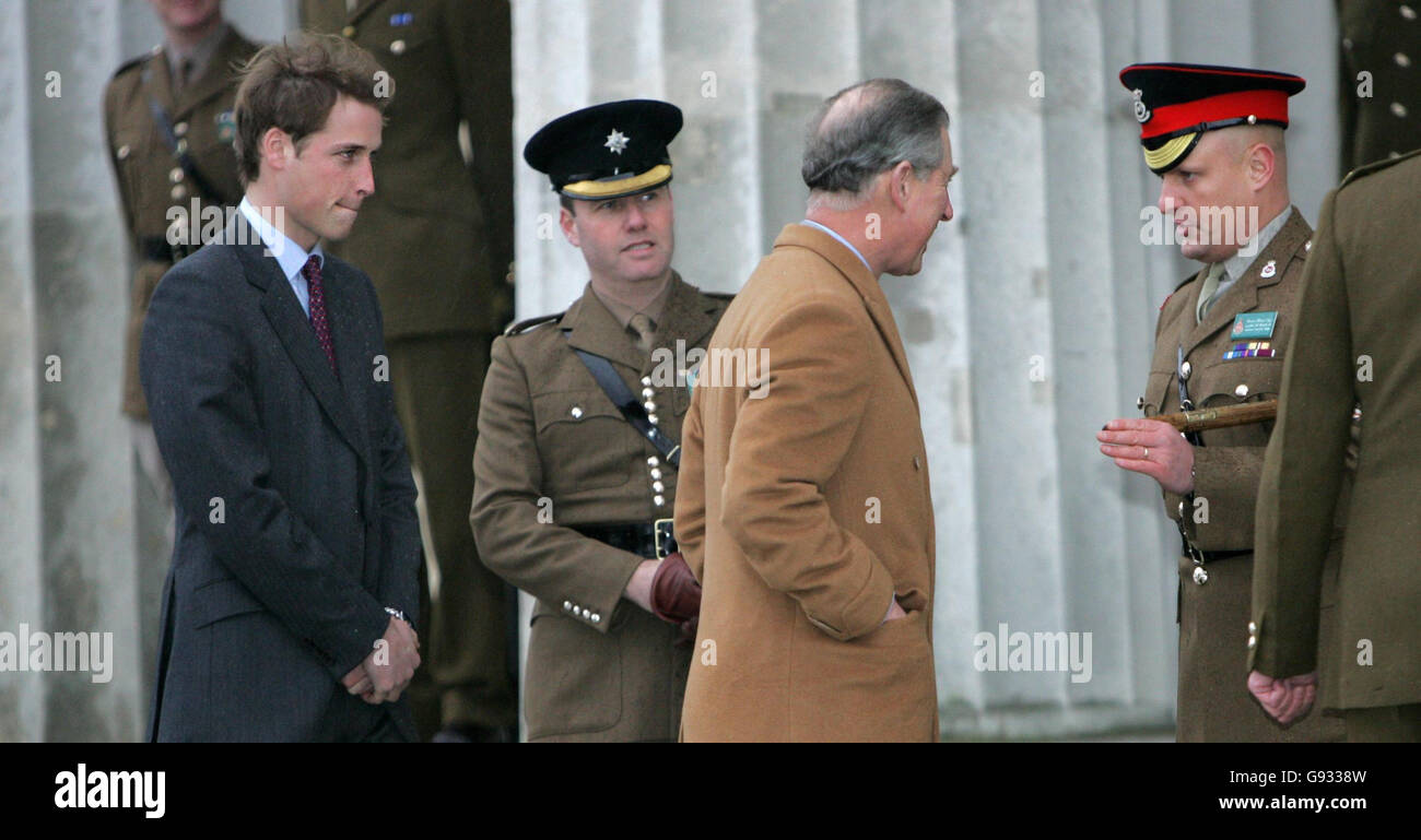 Prince William looks on as his father, the Prince of Wales, speaks to Academy Sergent Major Nichols (first Right) at the Royal Military Academy Sandhurst before the start of his Army Officer training Sunday 8th January 2005. See PA story ROYAL William. PRESS ASSOCIATION Photo. Photo credit should read: Tim Ockenden/WPA Rota/PA Stock Photo